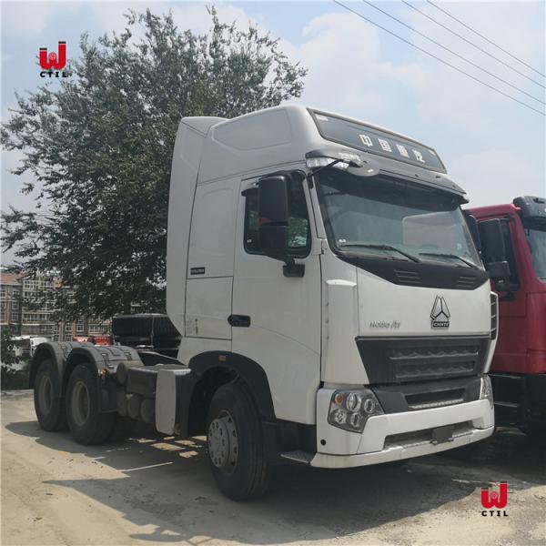 Quality SINOTRUK HOWO A7 420 HP 6x4 Tandem Axle Tractor Head Heavy Duty Tractor Truck for sale