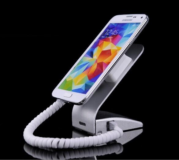 Quality COMER anti-theft security display for mobile phone Docking Station with Alarm Clock for sale