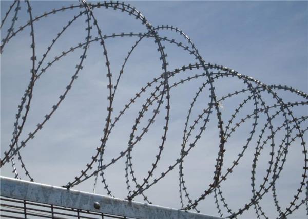 Quality Barbed Tape Razor Wire Made in Coils concertina line for Security Barrier Fencing for sale