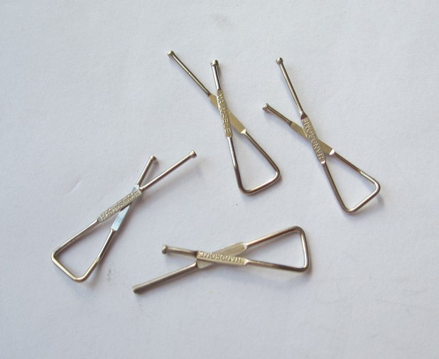 Fancy Size 33mm X shaped with copper material