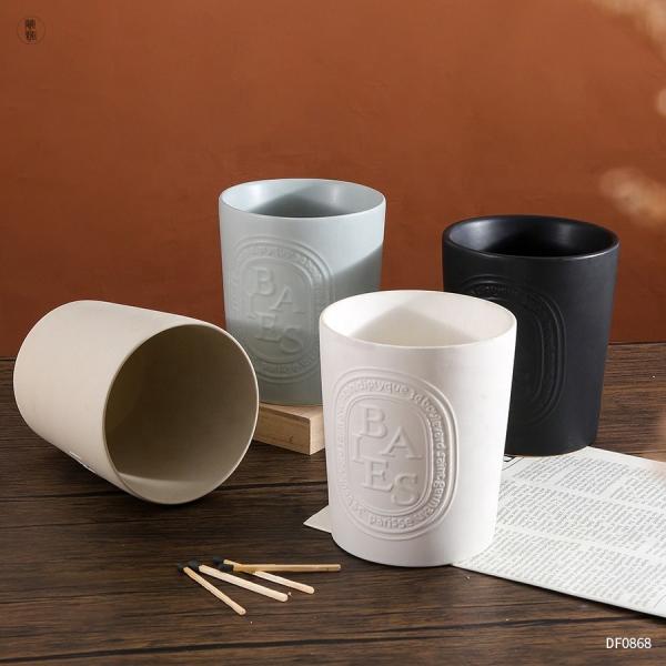 Quality Matte Embossed Empty Ceramic Candle Jar Multi Colored With Wooden Lids for sale