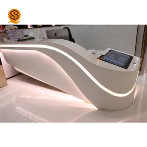 China Led Light Shopping Mall 2 Person White Solid Surface Reception Desk With Monitor on sale