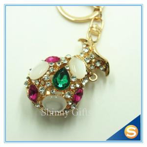 China Creative Metal Baking Key Chain Bag Backpack Key Chain Pendant on sale