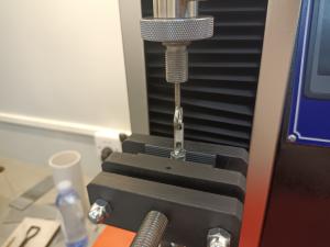 Wholesale ASTM D2061 Standard Universal Testing Machine 2KN Tensile Strength Measuring Machine UTM Desktop from china suppliers