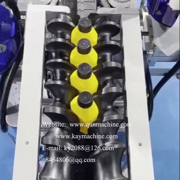 Timing screws to groups shaped square rectangular rectangle bottle containers into pairs for packaging. China manufacturer China factory China