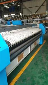 China Heavy Duty Automatic Feeding Machine Work With Ironing Machine Improving Efficiency on sale