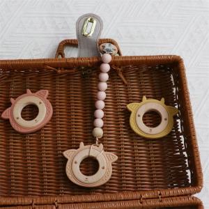 China Multifunctional Silicone Baby Teether With Attachable Teething Wooden Ring Animal Pattern on sale