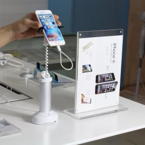 Wholesale COMER wholesale high quality low cost mobile phone security display charging holder with alarm from china suppliers