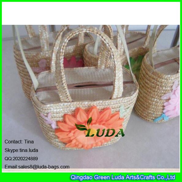 Quality LDMC-012 big sunflower kids handbag fashion wheat straw personalized beach bag for sale