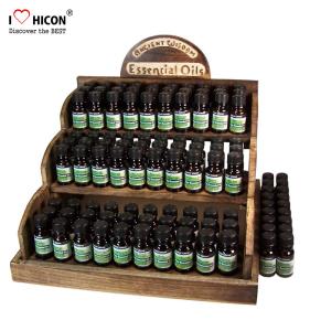 China Counter Display Rack Fragrance Wooden Essential Oil Display Rack on sale