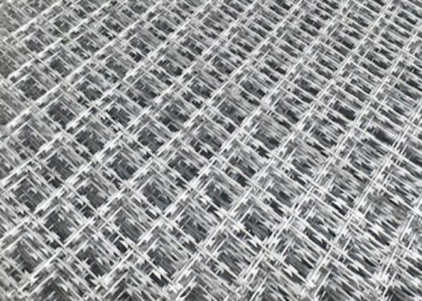 Quality Galvanized Spiral Cross Razor Blade Fencing Wire Ink Green Razor Barbed Wire for sale