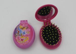 China Fashsion Oval Shape 2 In 1 Folding Travel Hair Brush With Mirror And Comb on sale