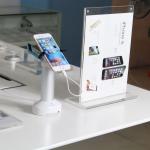 COMER new popular counter stands with charging function mobile phone display