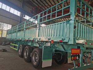 China Triple Axle 40T 60T Tons Stake Cargo Trailer Fence Bulk Cargo Trailer Transporter Semi Trailer on sale