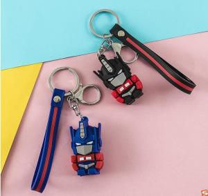 China Keychain Optimus Robot Men And Women Doll Couple Key Chain on sale